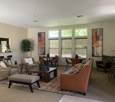 Community room with seating and windows